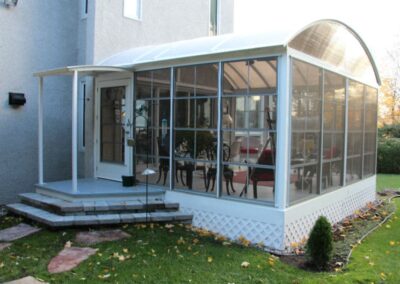 Solarium 3 saisons avec toiture arrondie